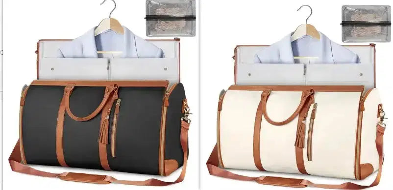 Black and cream garment bags with brown leather handles, holding hanging suits for travel or storage